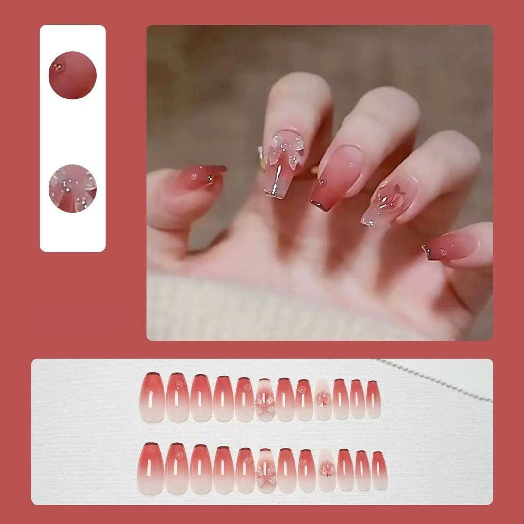 Artificial nails with floral design and glitter accents Bowlift