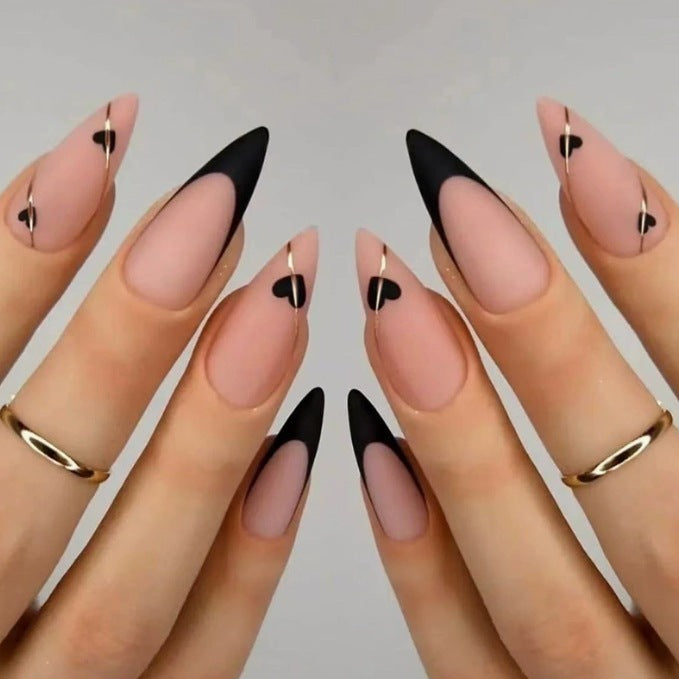 Heart-Embellished Stiletto Nail Art Bowlift