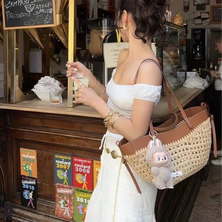 Braided handbag with elegant leather trim Bowlift