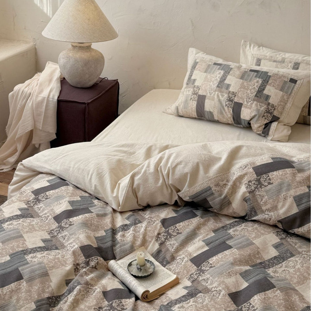 Modern patchwork bedding set in linen look with reversible design