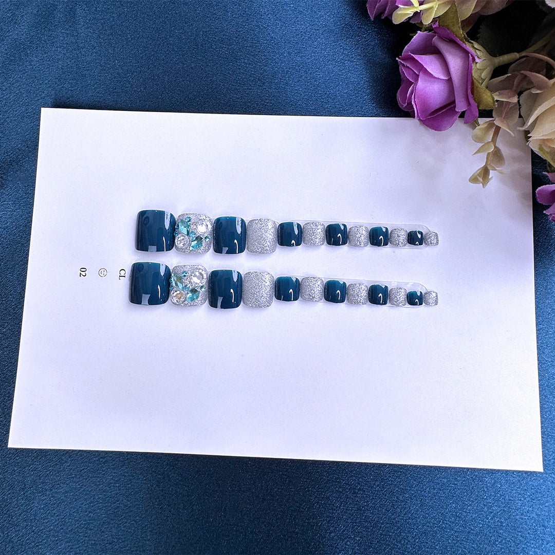 Artful toenail art with glitter and stone appliqués Bowlift