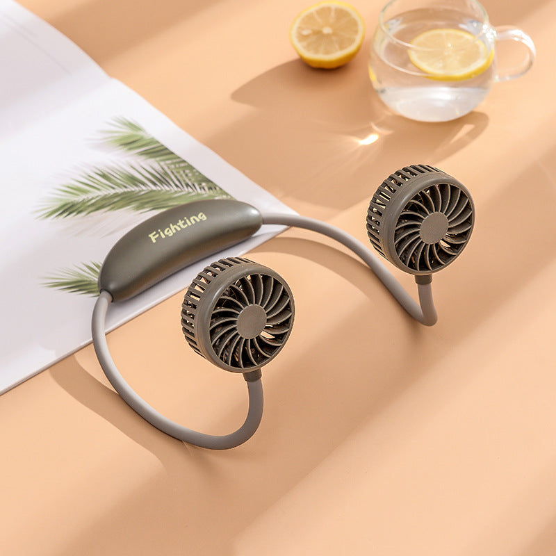 Unisex portable neck fan with dual fan heads, flexible neckband, quiet brushless motor, and USB charging function Bowlift