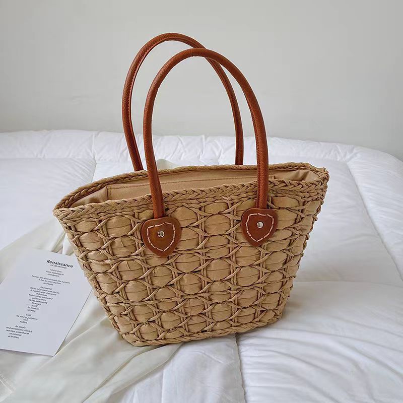 Handcrafted basket bag with elegant leather accents Bowlift