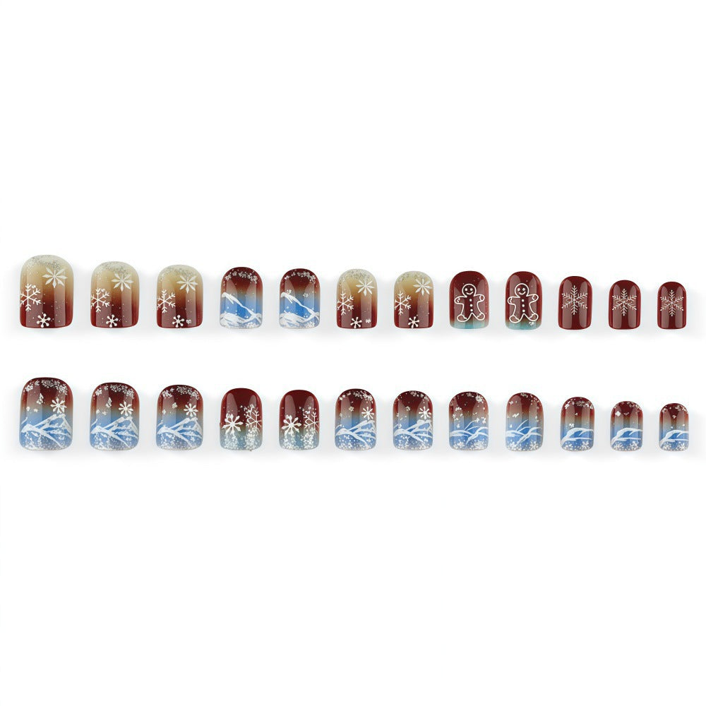 Artificial nails with festive snowflake and gingerbread motif Bowlift