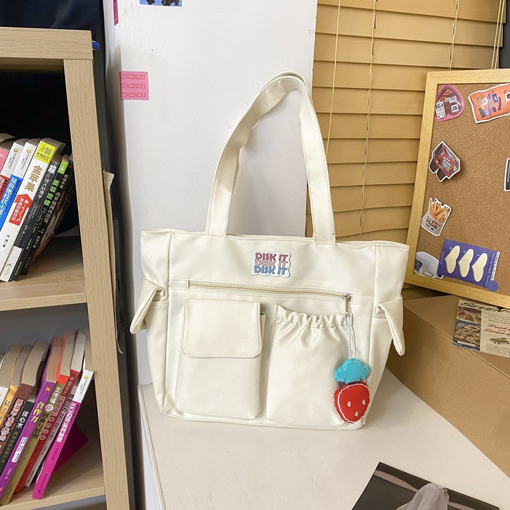 Tote bag with versatile compartments and ergonomic design Bowlift