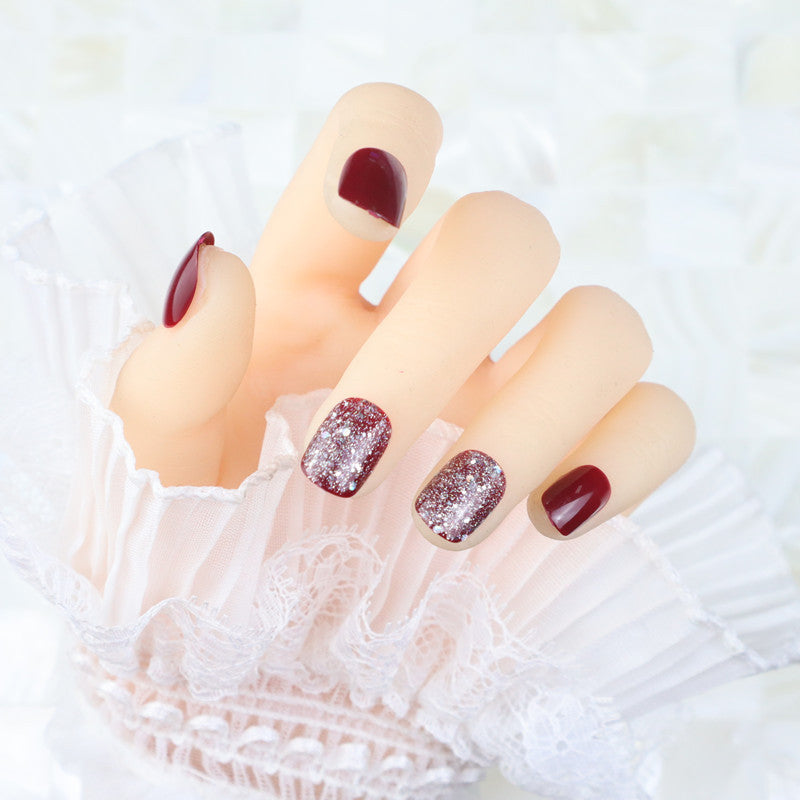 Glossy Press-On Nail Set with Glitter Accents Bowlift