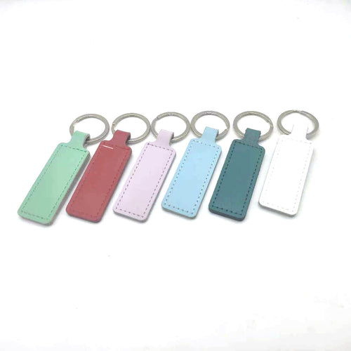 Unisex keychain with customizable faux leather Bowlift