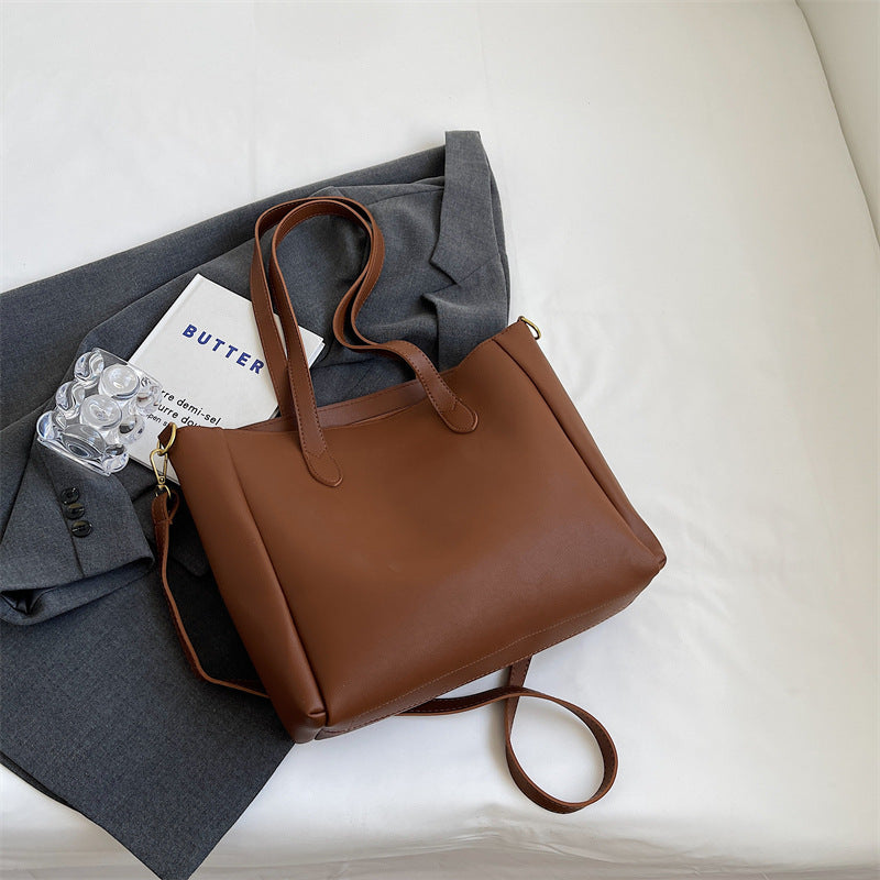 Contemporary Minimalist Handbag Bowlift