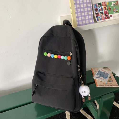Practical backpack with colorful applications Bowlift