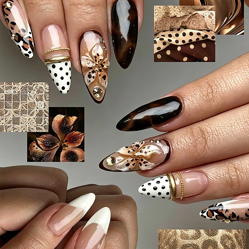 Exquisite nail art with elegant embellishments Bowlift