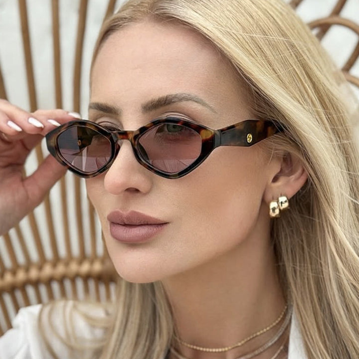 Women's fashionable sunglasses in striking butterfly design Bowlift