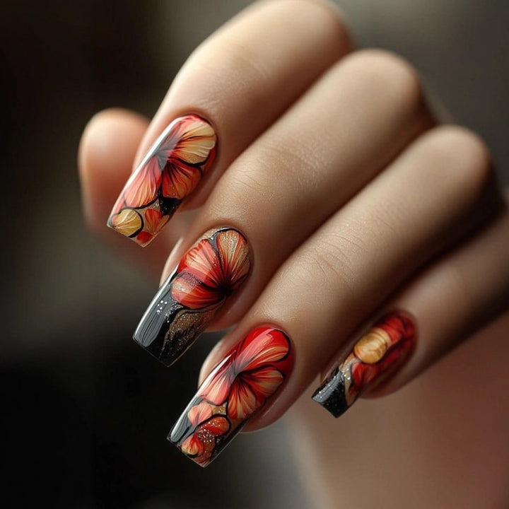 Artificial nails with floral designs and glitter accents Bowlift