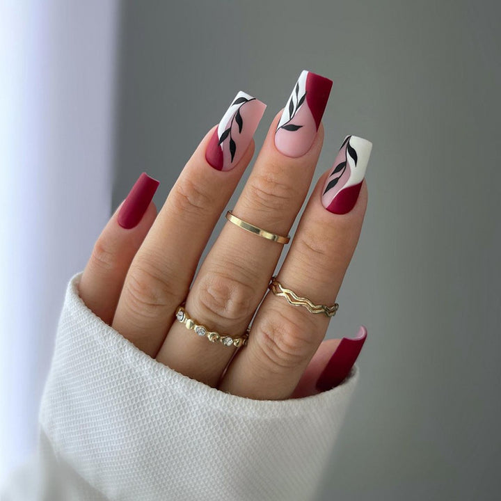 Elegant Stiletto Press-On Nail Art with Rhinestone Accents Bowlift