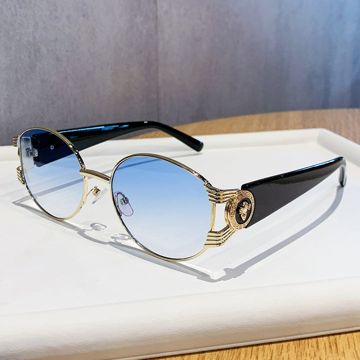 Ladies elegant sunglasses with luxurious metal frame and mirrored lenses Bowlift
