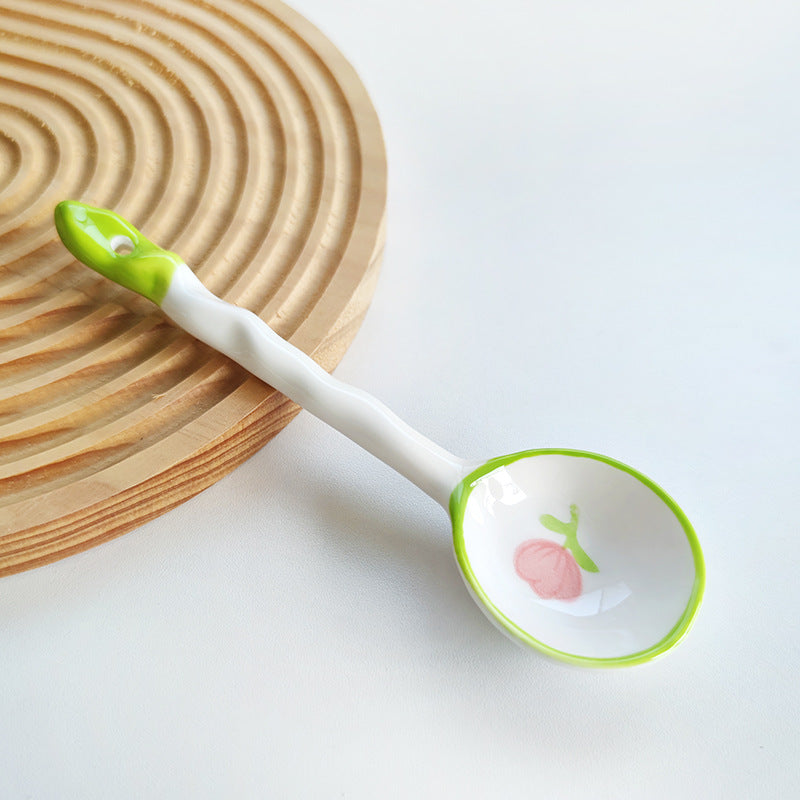 Ceramic soup spoon with lucky cat illustration and ergonomic long-handle Bowlift