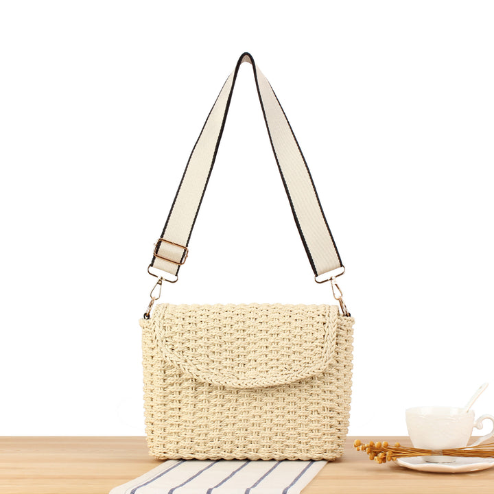Handbag made of woven natural material with adjustable shoulder strap Bowlift