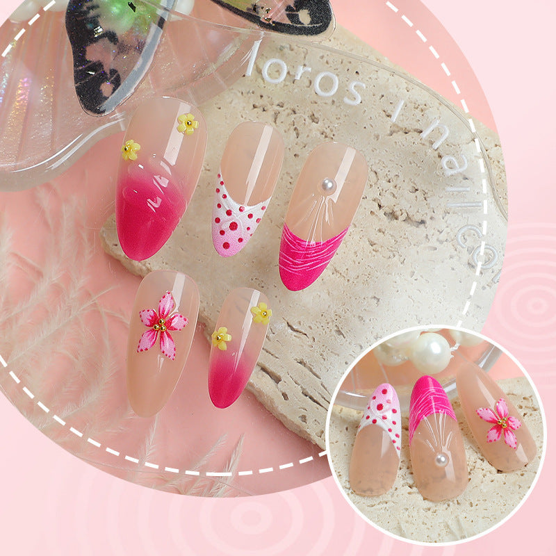 Artful nail tips with delicate floral embellishments Bowlift