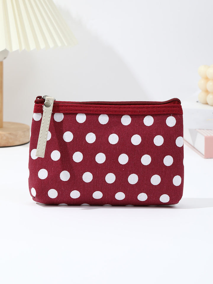 Canvas polka dot cosmetic pouch with zippered faux leather pull Bowlift