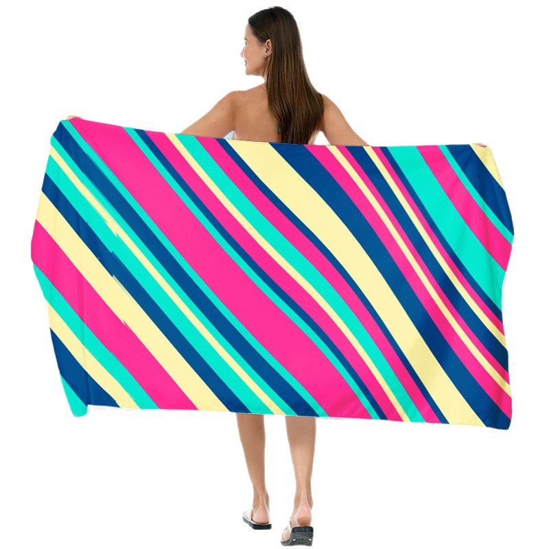 Beach towel with vibrant gradient color and stylish striped design Bowlift