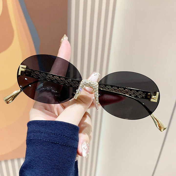 Women's sunglasses with glittering frame and oval lenses Bowlift