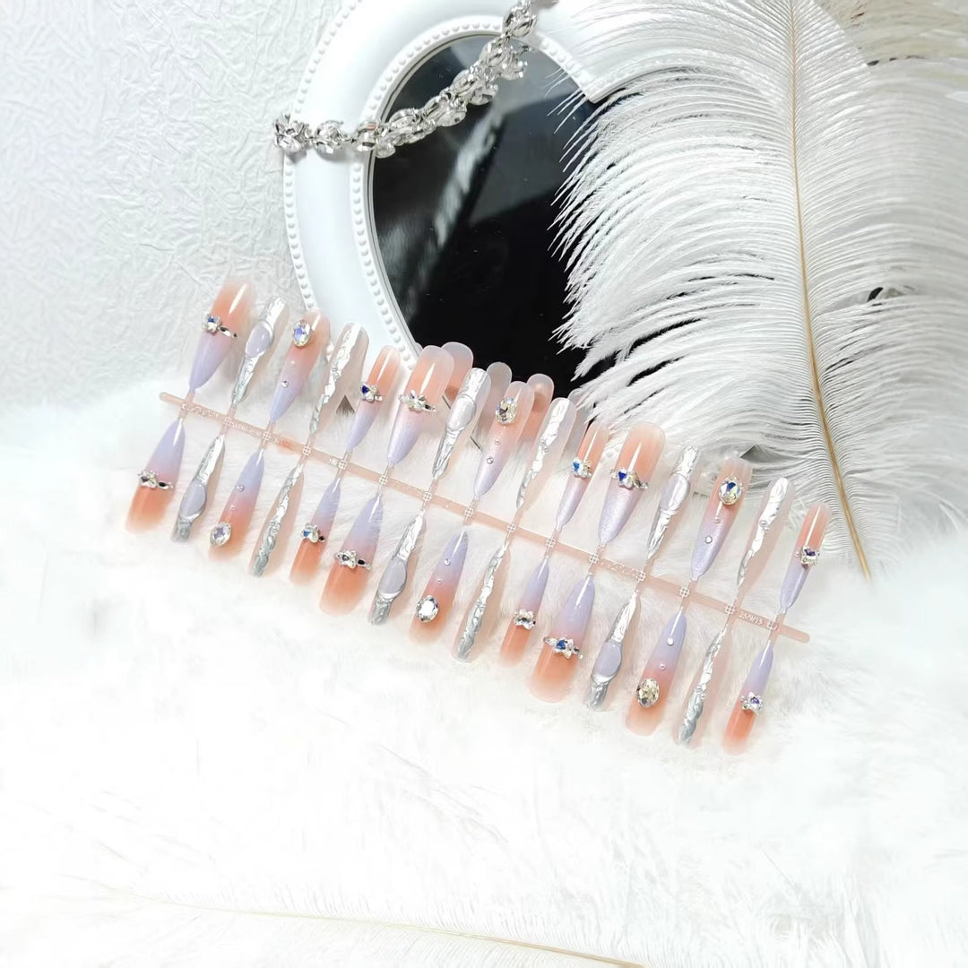 Artificial nails with elegant glitter and crystal accents Bowlift