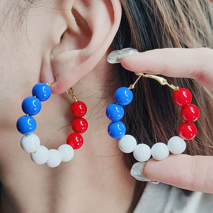 Women's nan statement hoops with large pearl beads and clip closure Bowlift