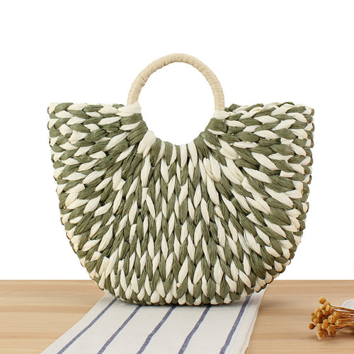Wicker bag in modern design with artistic weaving Bowlift
