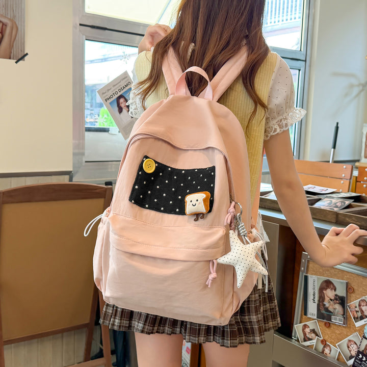 Playful Cartoon-Themed Backpack Bowlift