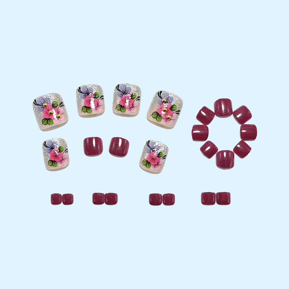 Artificial nails with floral motifs and glitter accents Bowlift