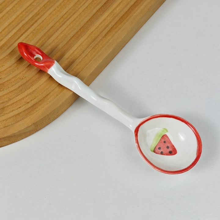 Ceramic soup spoon with lucky cat illustration and ergonomic long-handle Bowlift