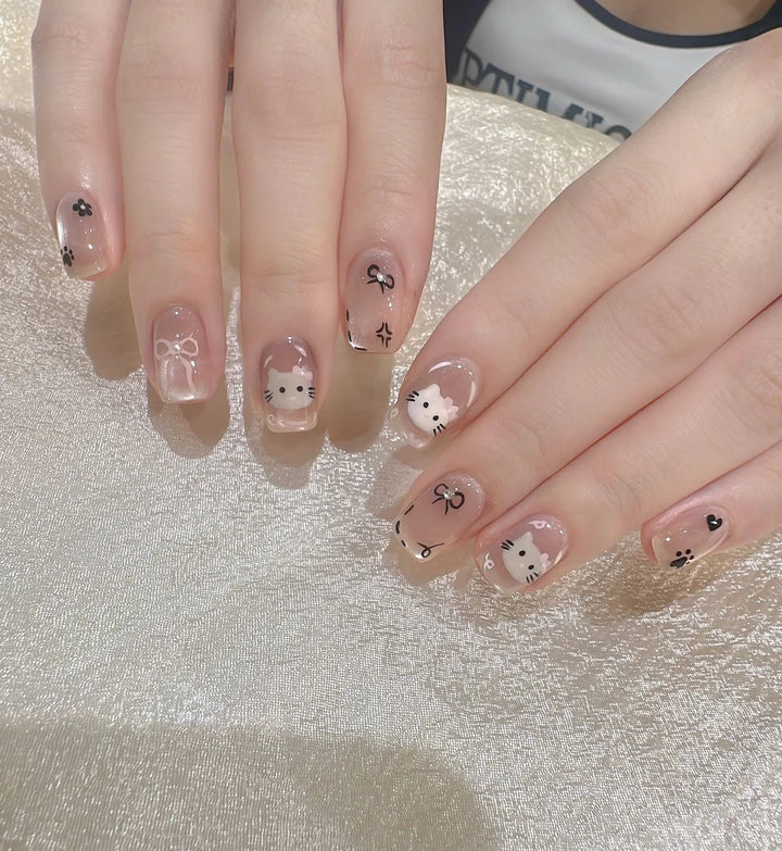 Artistic Long Stiletto Press-On Nails with Floral and Gemstone Accents Bowlift