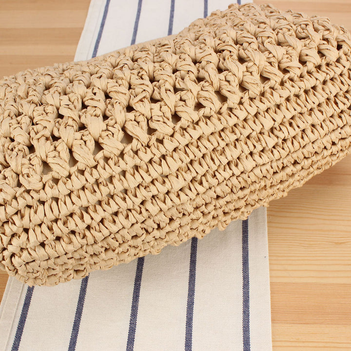 Fine straw shoulder bag with elegant chain accents Bowlift
