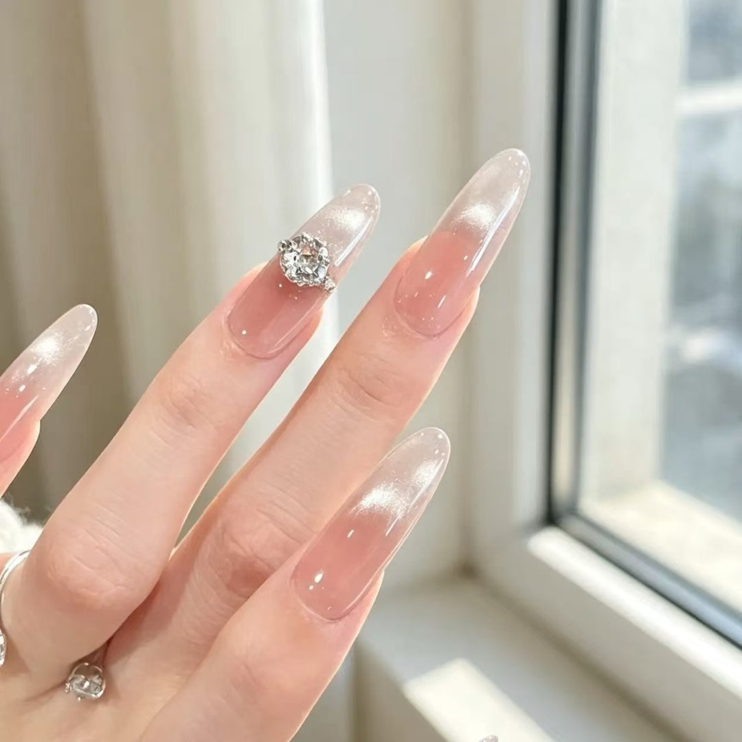 Elegant Stiletto Nail Extensions with Crystal Accent