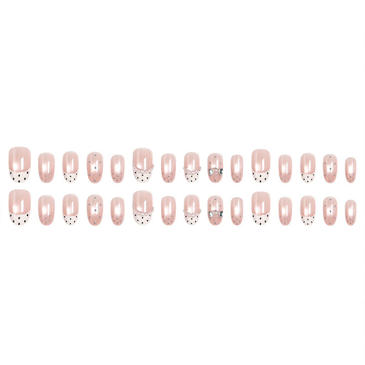 Artificial nail set with elegant French design and delicate pearl embellishments Bowlift
