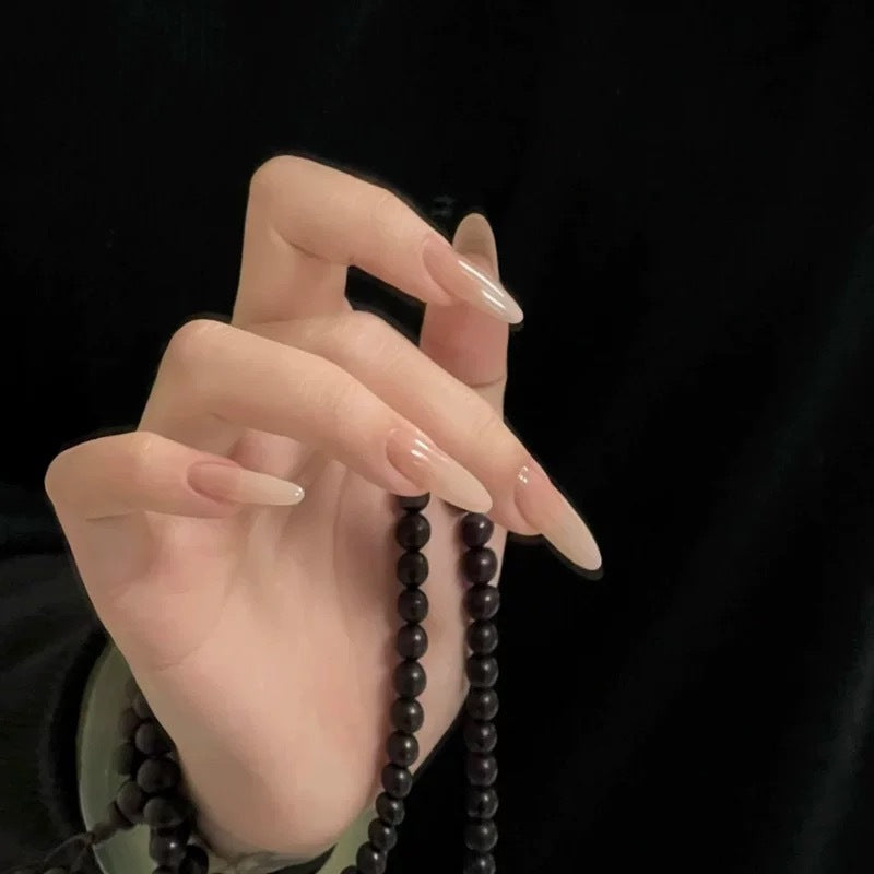 Artistic Press-On Nail Extensions with Floral Embellishments Bowlift