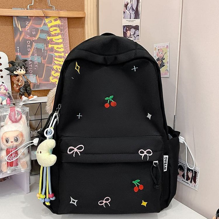 Playful backpack with embroidery Bowlift