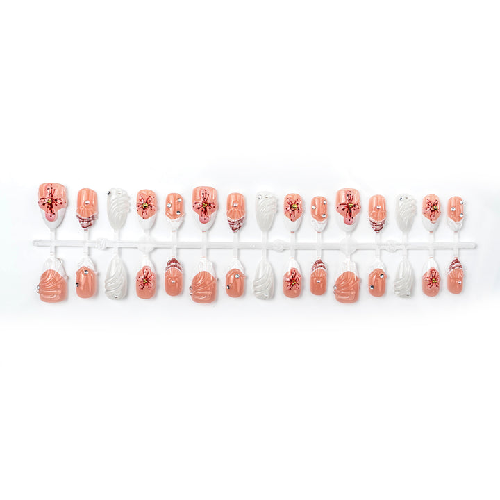Artificial nails with handcrafted flower and glitter elements Bowlift