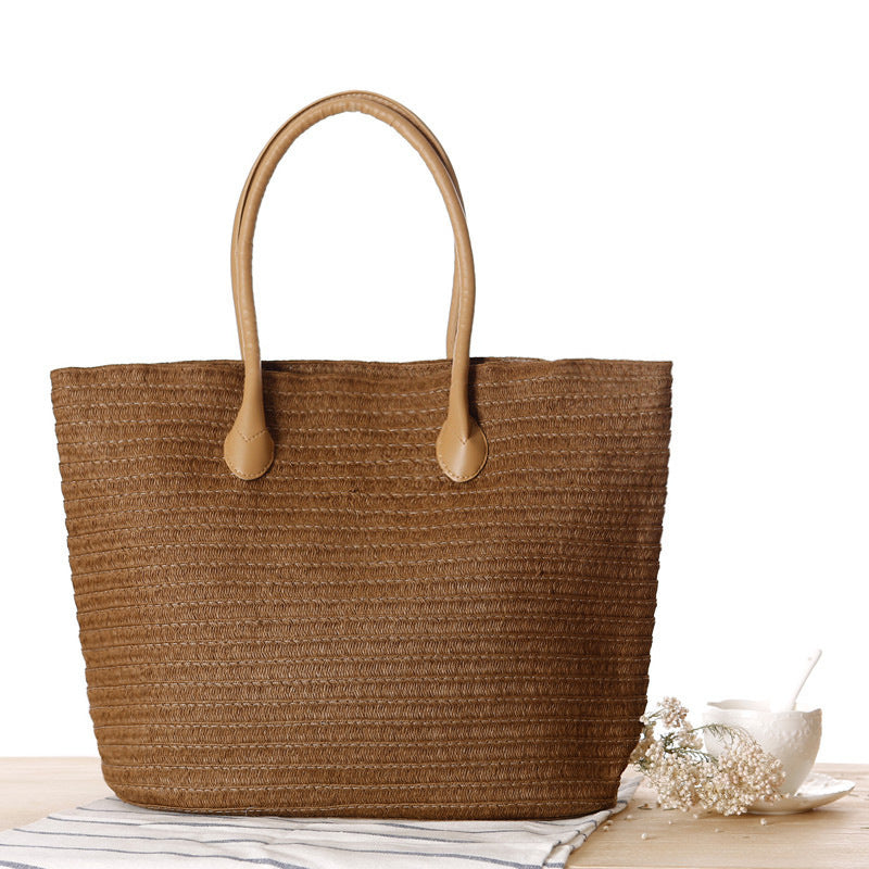 Spacious straw shopper with leather carrying handles Bowlift
