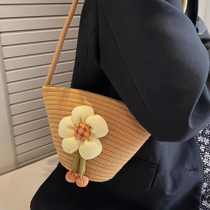 Handcrafted shoulder bag with flower applique Bowlift