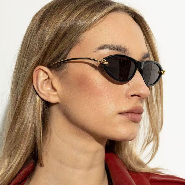 Women's Cat-Eye Sunglasses with Elegant Metal Frame and Protective UV Filter Bowlift