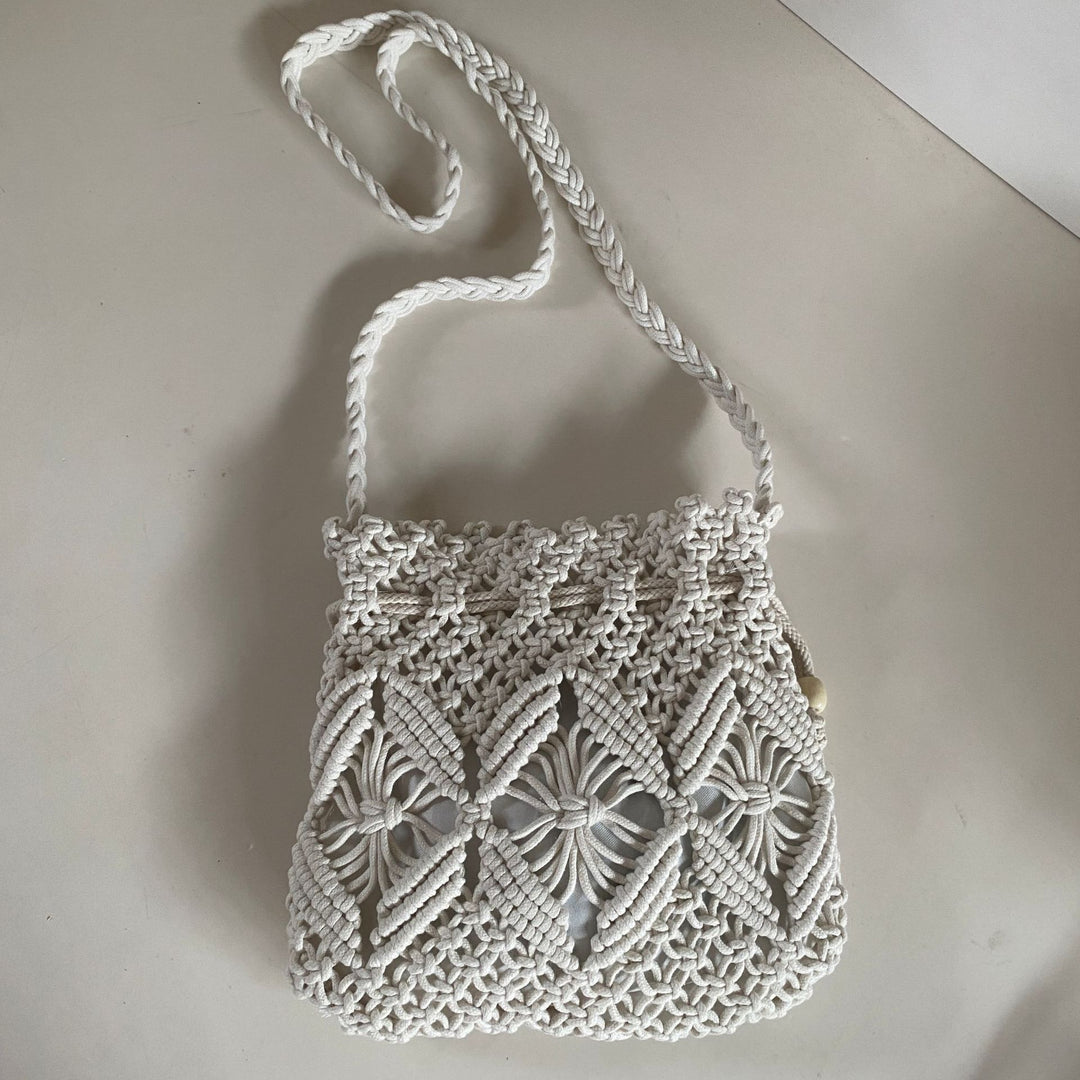 Hand-knotted shoulder bag with floral details Bowlift