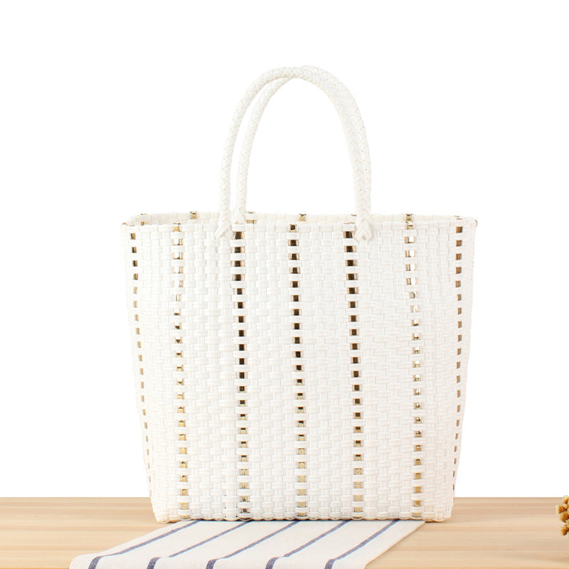 Fashionable basket bag with elegant accents Bowlift
