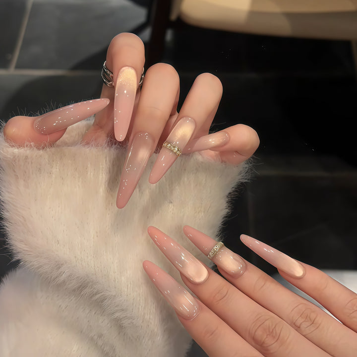 Glamorous artificial nails with elegant glitter and rhinestone application Bowlift