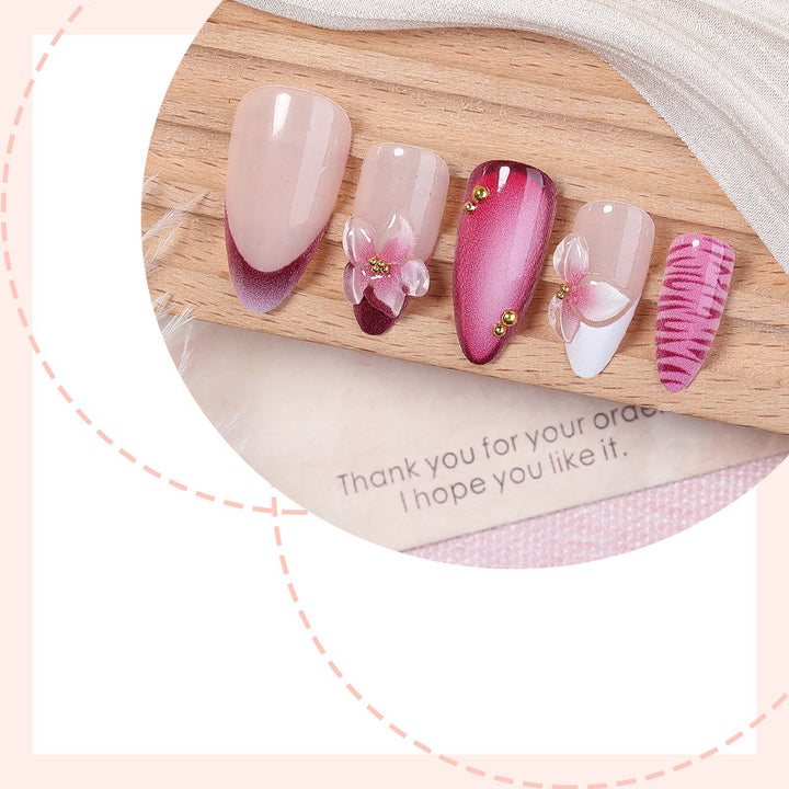 Artificial nail set with floral accents and ombre effect Bowlift