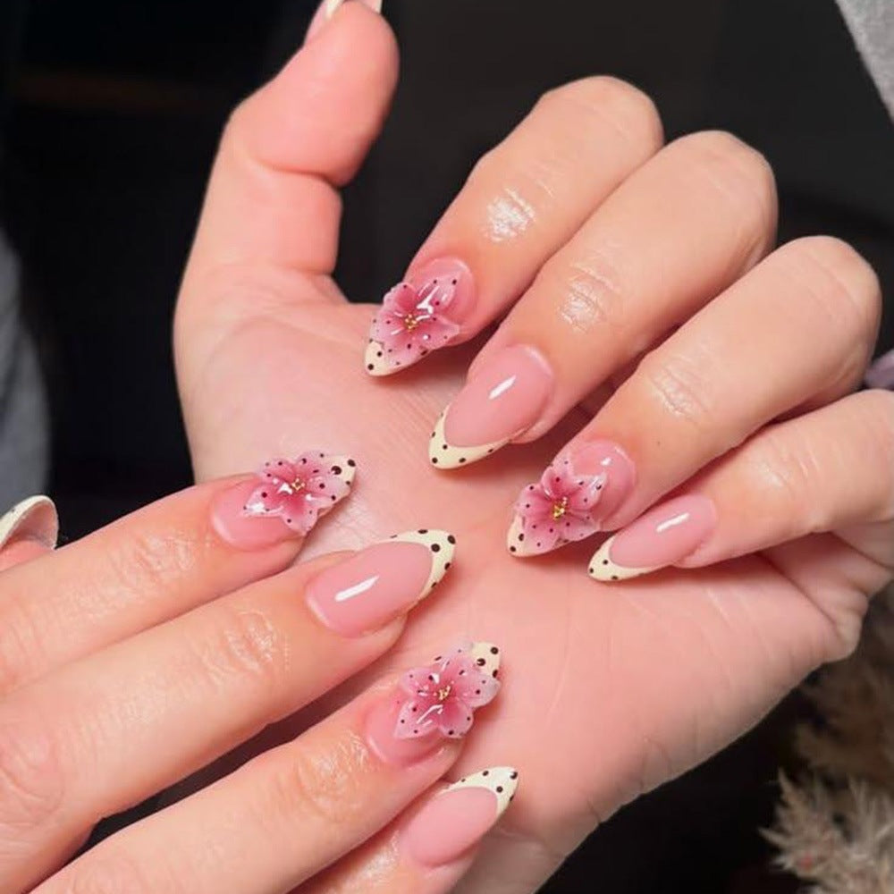 Nail art with floral 3D flower design and elegant color gradient Bowlift