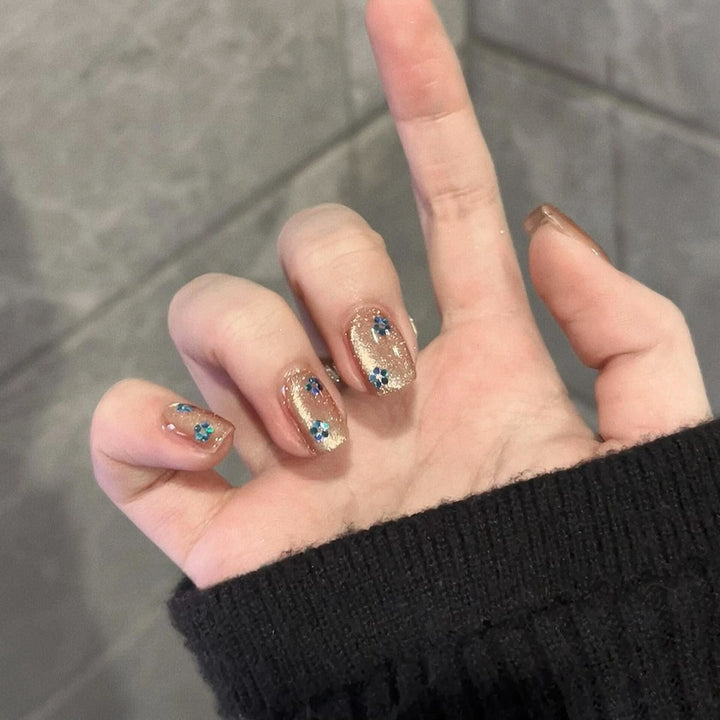 Glittering artificial nails with floral design Bowlift