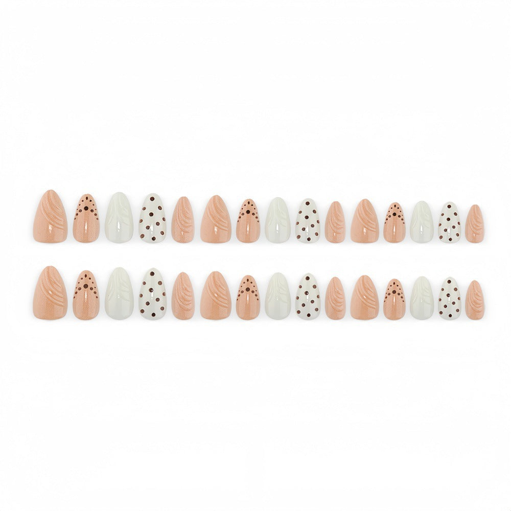 Artificial nails in refined dot design Bowlift