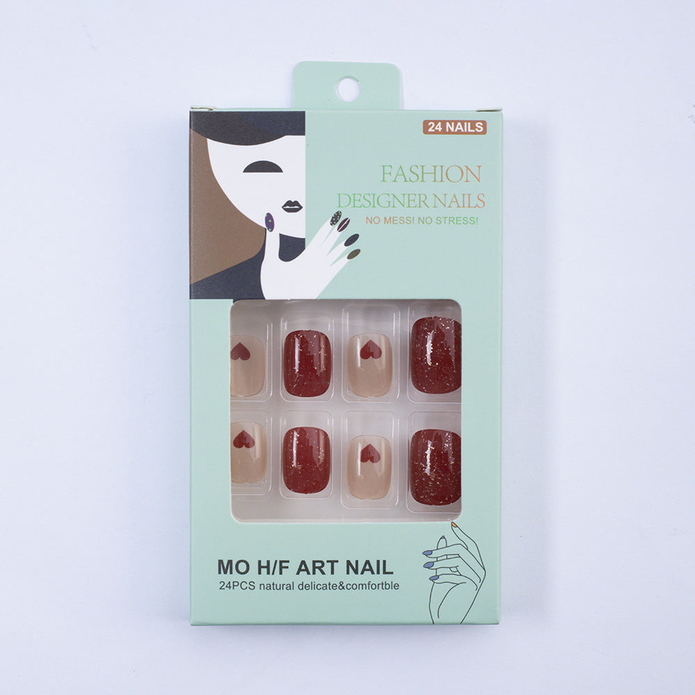Art nail set with heart designs and glitter Bowlift
