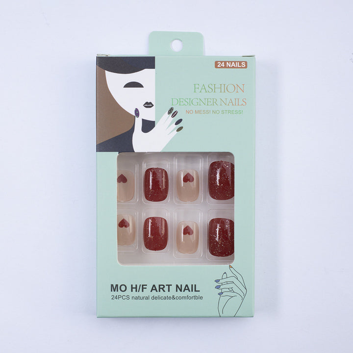 Art nail set with heart designs and glitter Bowlift