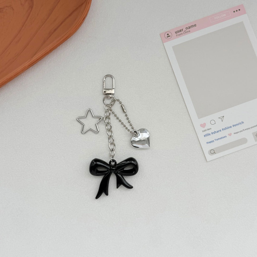 Playful Bow and Star Keychain Bowlift